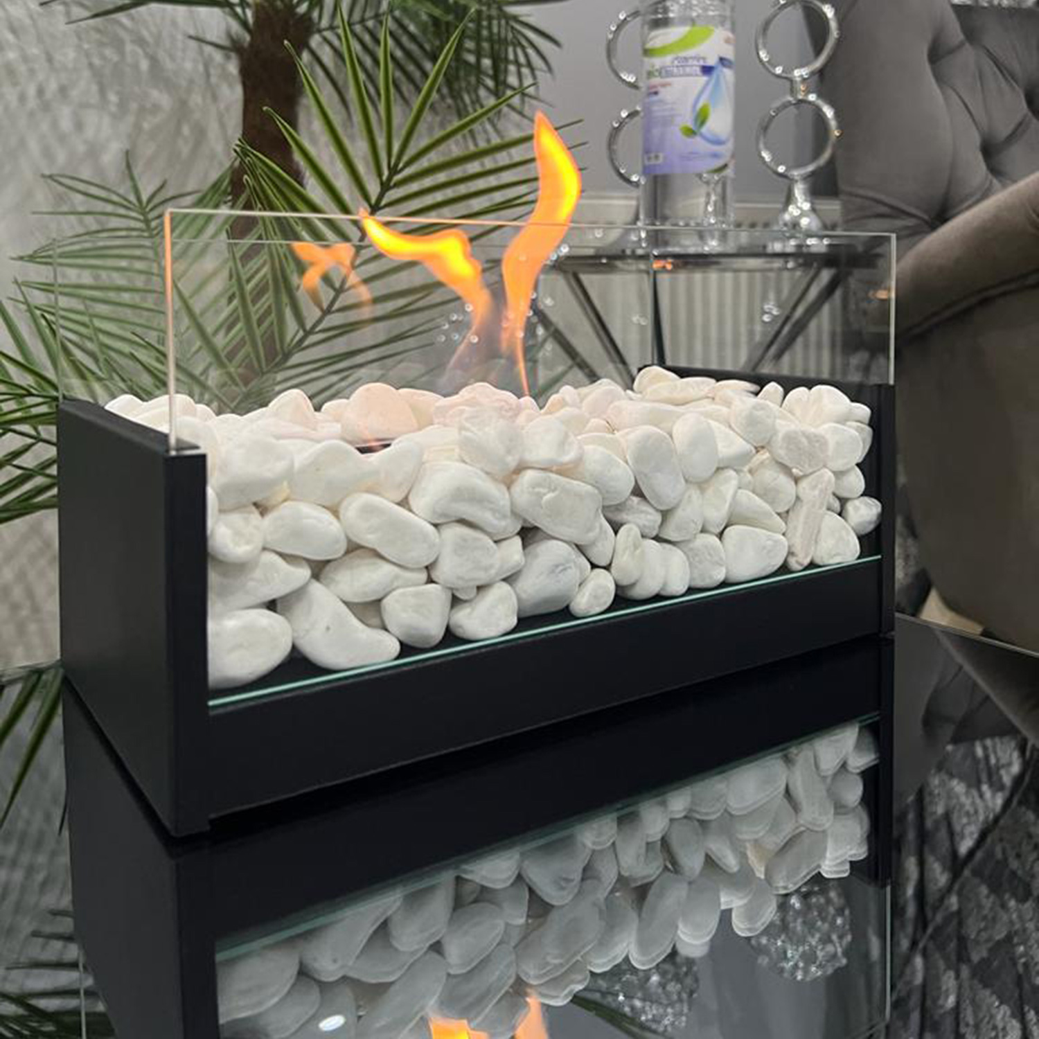 metal bioethanol fireplace with white stones